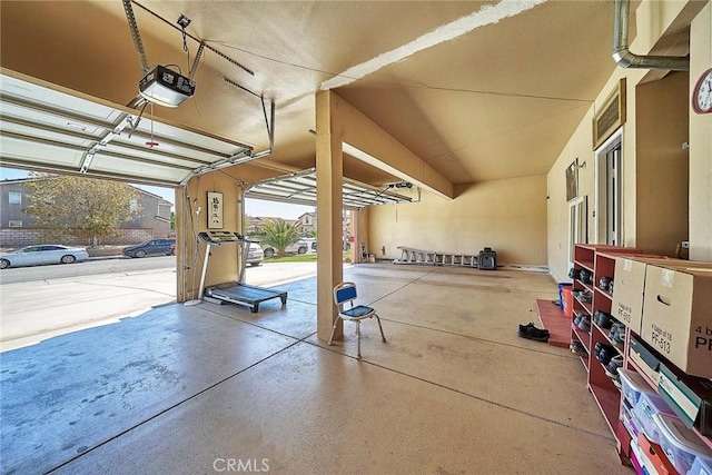 garage featuring a garage door opener