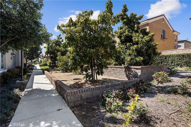 view of yard with fence