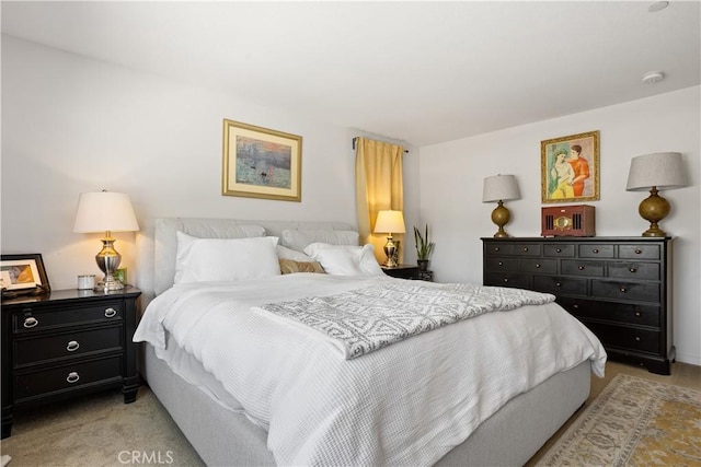 bedroom with light carpet