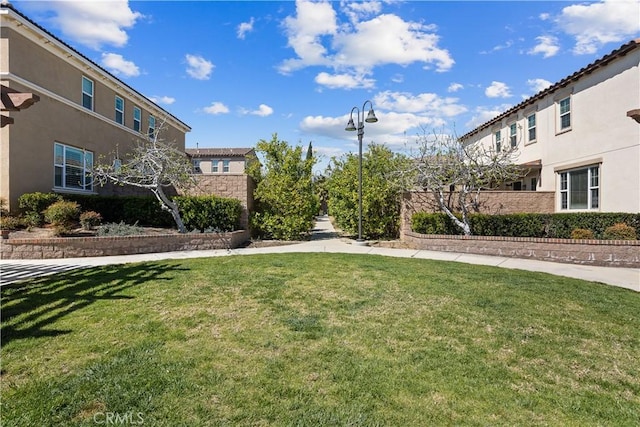 surrounding community with a lawn