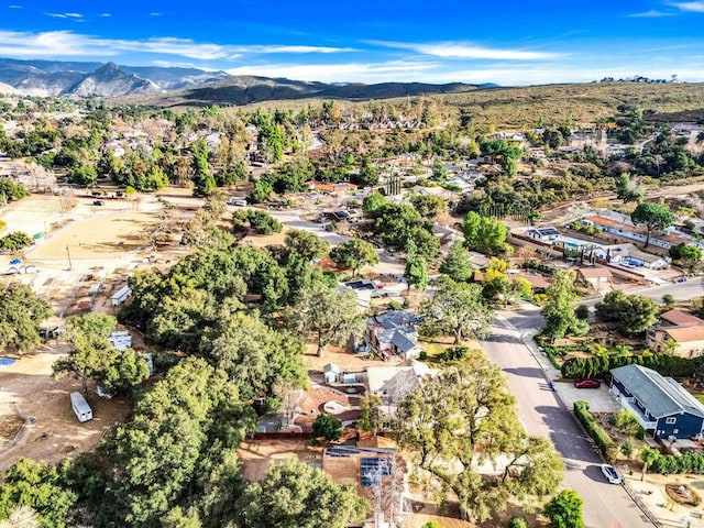 drone / aerial view with a residential view and a mountain view