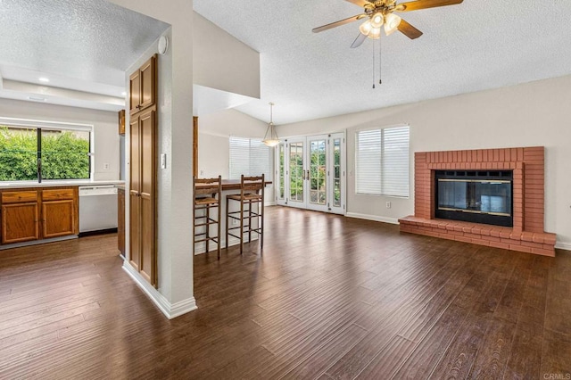 688 Via Encantada, Chula Vista, CA 91913 - unfurnished living room with a textured ceiling, dark wood-style floors, ceiling fan, a sink, and baseboards