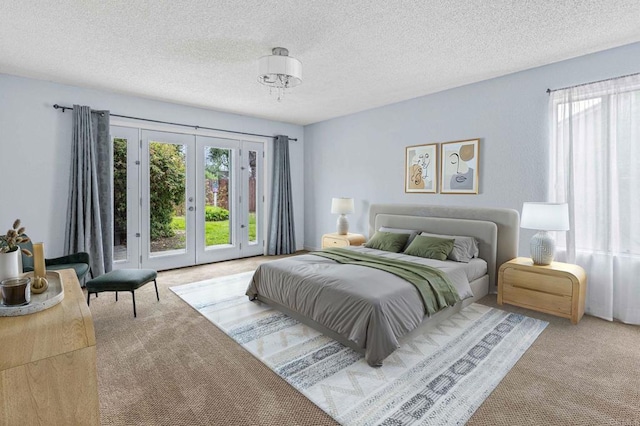 688 Via Encantada, Chula Vista, CA 91913 - carpeted bedroom featuring access to exterior, multiple windows, french doors, and a textured ceiling