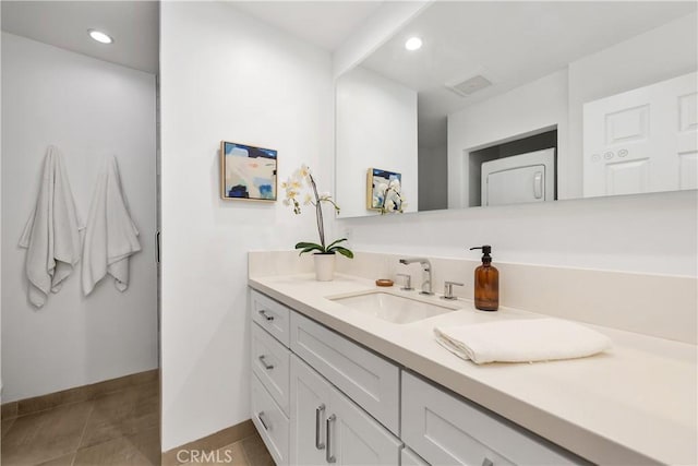 bathroom with tile patterned floors, visible vents, baseboards, recessed lighting, and vanity