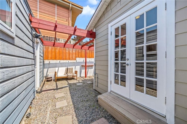 view of property exterior with french doors