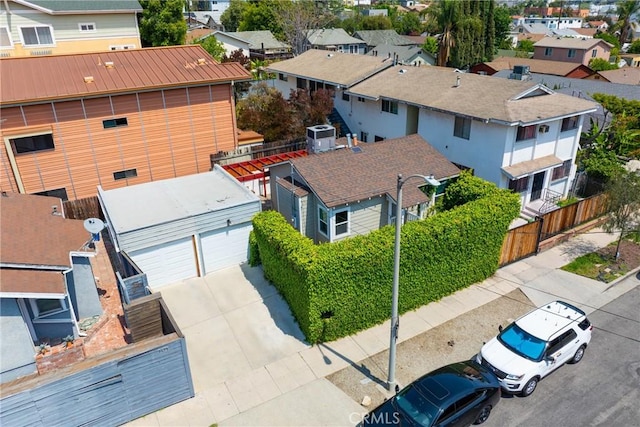 birds eye view of property with a residential view