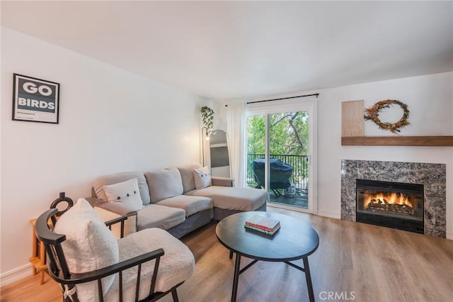 1600 Redondo Ave Unit 4, Long Beach, CA 90804 - living room featuring wood finished floors and a premium fireplace