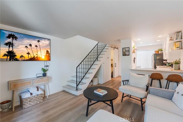 1600 Redondo Ave Unit 4, Long Beach, CA 90804 - living area featuring stairway, wood finished floors, and recessed lighting