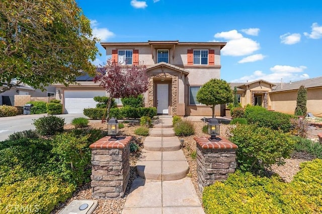 2613 Lincoln Ln, Palmdale, CA 93551 - view of front of property with roof mounted solar panels, concrete driveway, a garage, and stucco siding