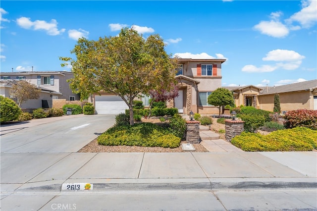 2613 Lincoln Ln, Palmdale, CA 93551 - view of front of house featuring a residential view, an attached garage, concrete driveway, and stucco siding