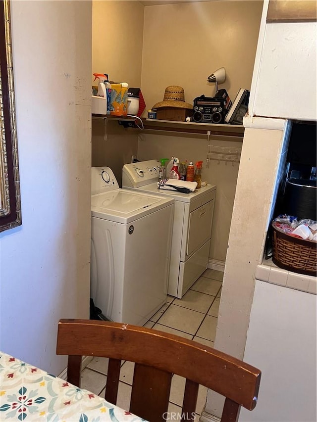 951 E 7th St, Beaumont, CA 92223 - washroom with washer and dryer and light tile patterned flooring