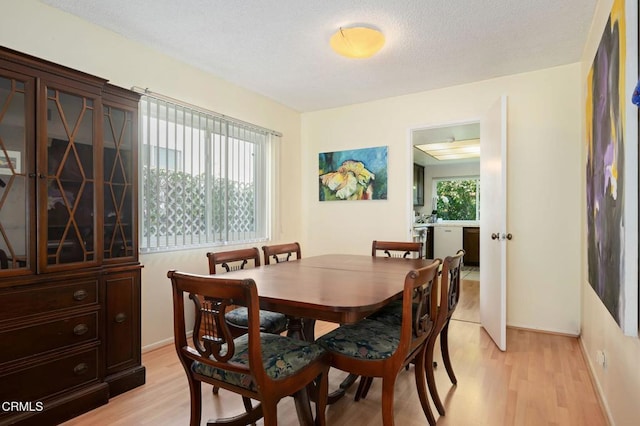 1126 Lawrence Way, Oxnard, CA 93035 - dining room with light wood-type flooring and baseboards