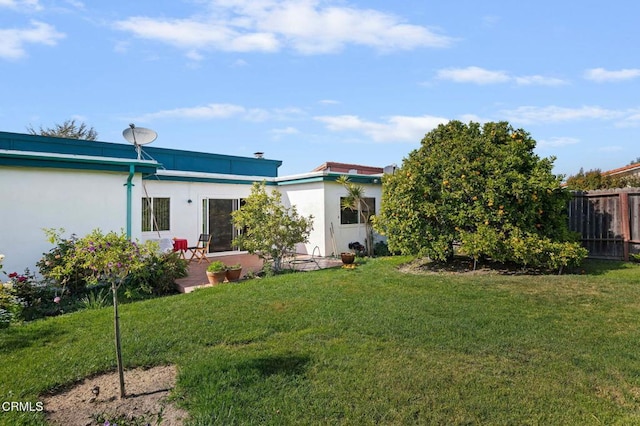 1126 Lawrence Way, Oxnard, CA 93035 - rear view of house with stucco siding and a patio