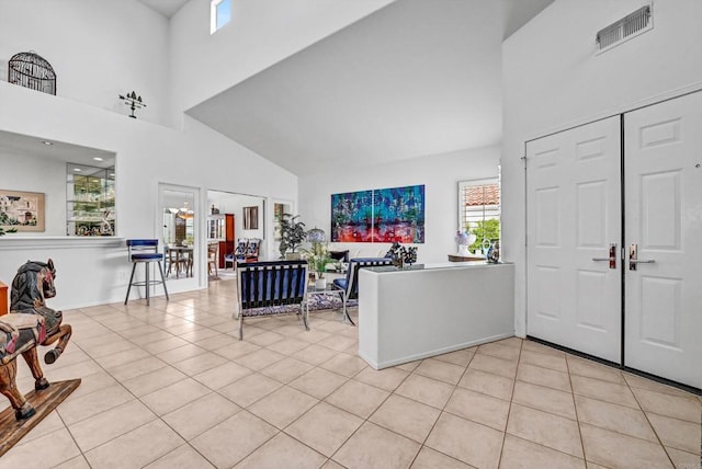 4981 Lamia Way, Oceanside, CA 92056 - entrance foyer with a towering ceiling and light tile patterned flooring