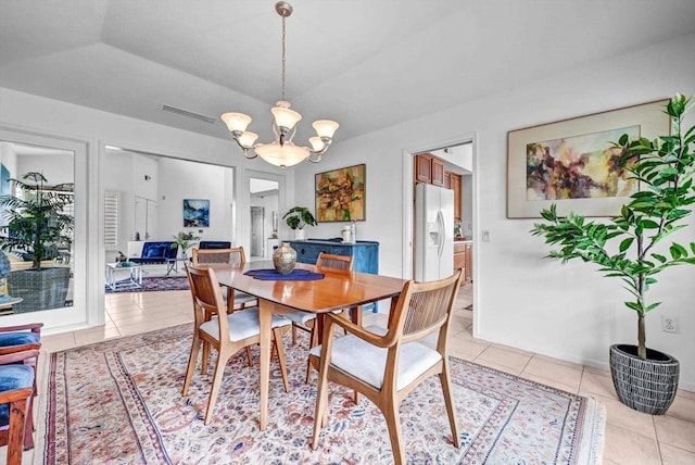 4981 Lamia Way, Oceanside, CA 92056 - dining area featuring a chandelier and light tile patterned flooring