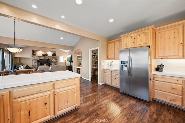 28136 N Bay Rd, Lake Arrowhead, CA 92352 - kitchen featuring stainless steel fridge with ice dispenser, light brown cabinets, lofted ceiling, open floor plan, and dark wood-type flooring