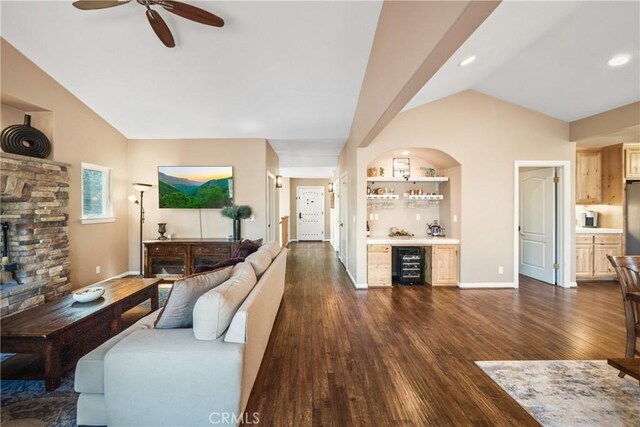 28136 N Bay Rd, Lake Arrowhead, CA 92352 - living area featuring lofted ceiling, beverage cooler, a bar, dark wood-style flooring, and a ceiling fan