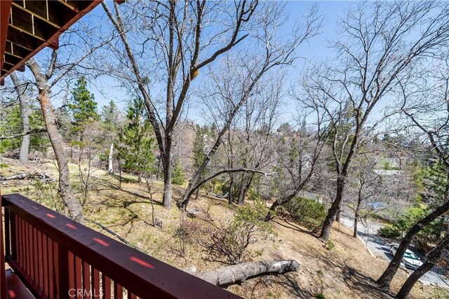 28136 N Bay Rd, Lake Arrowhead, CA 92352 - view of yard featuring a balcony and view of scattered trees