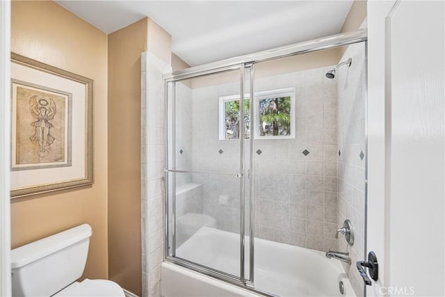 28136 N Bay Rd, Lake Arrowhead, CA 92352 - full bathroom featuring toilet and shower / bath combination with glass door
