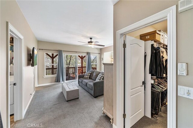 28136 N Bay Rd, Lake Arrowhead, CA 92352 - carpeted living area featuring ceiling fan, baseboards, and an AC wall unit