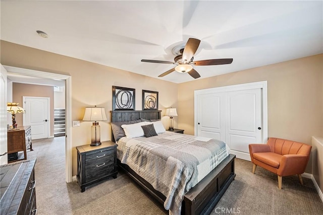 28136 N Bay Rd, Lake Arrowhead, CA 92352 - carpeted bedroom with a closet, a ceiling fan, and baseboards