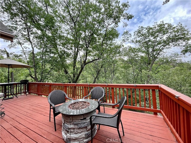 28136 N Bay Rd, Lake Arrowhead, CA 92352 - wooden terrace with a fire pit