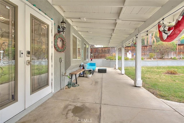 view of patio with a fenced backyard and french doors