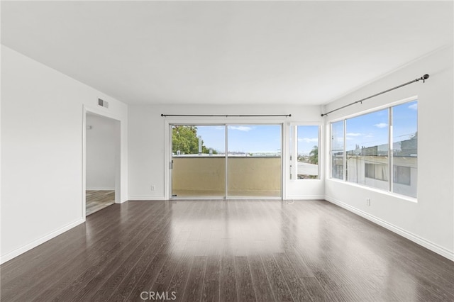 1729 S Alma St, San Pedro, CA 90731 - spare room featuring dark wood finished floors and baseboards