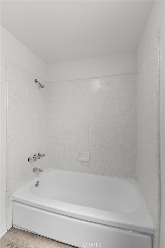 1729 S Alma St, San Pedro, CA 90731 - bathroom with wood finished floors and washtub / shower combination
