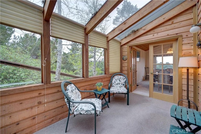 sunroom / solarium with beamed ceiling