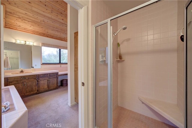 bathroom with a shower stall, vanity, a bathtub, wood ceiling, and lofted ceiling