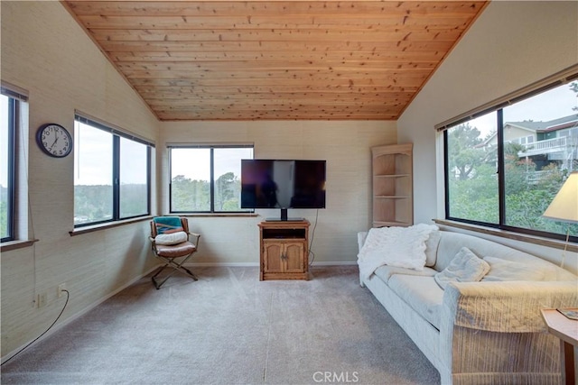 carpeted living room featuring wood ceiling, lofted ceiling, and plenty of natural light