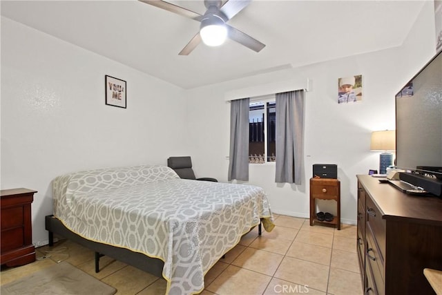 bedroom featuring ceiling fan and light tile patterned floors