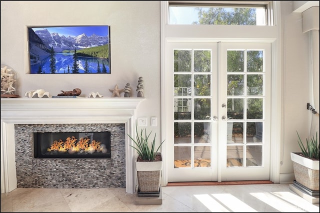 23962 Lanteen Cir, Laguna Niguel, CA 92677 - entryway featuring a premium fireplace, french doors, and tile patterned flooring
