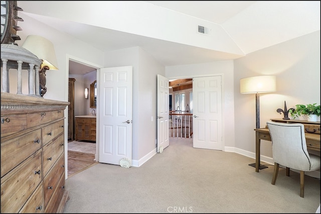 23962 Lanteen Cir, Laguna Niguel, CA 92677 - office area featuring light carpet, baseboards, lofted ceiling, and a sink