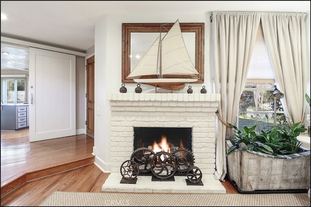 23962 Lanteen Cir, Laguna Niguel, CA 92677 - detailed view of wood finished floors, baseboards, and a fireplace