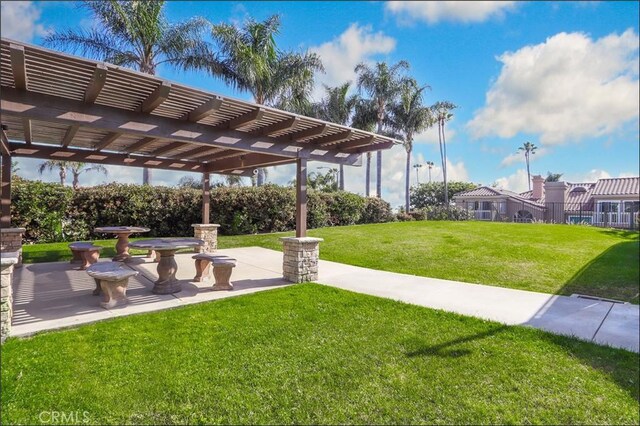 23962 Lanteen Cir, Laguna Niguel, CA 92677 - view of property's community with a pergola and a yard