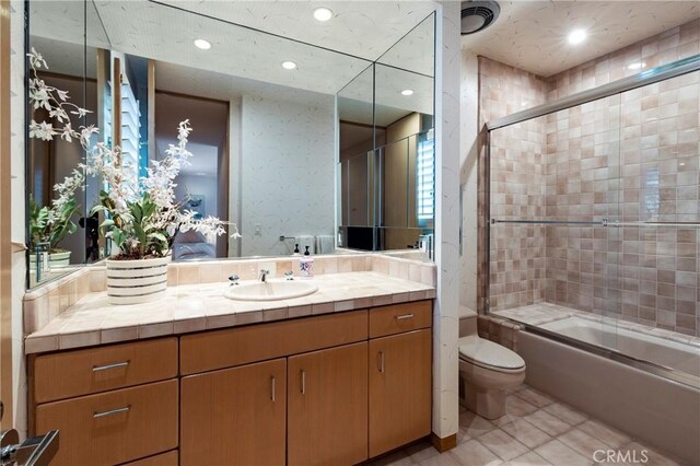 812 W Bay Ave, Newport Beach, CA 92661 - bathroom with recessed lighting, toilet, tile patterned flooring, vanity, and combined bath / shower with glass door
