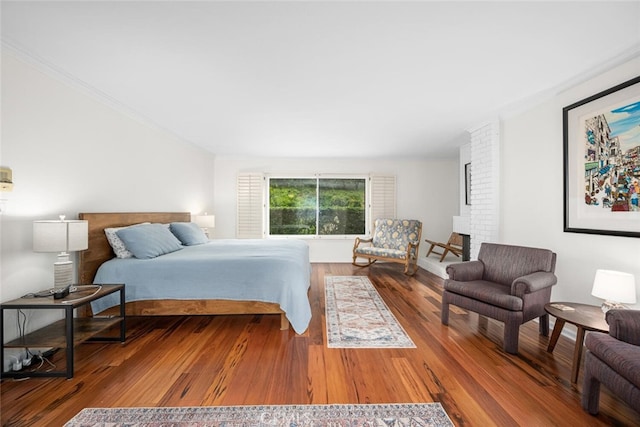 bedroom with wood finished floors