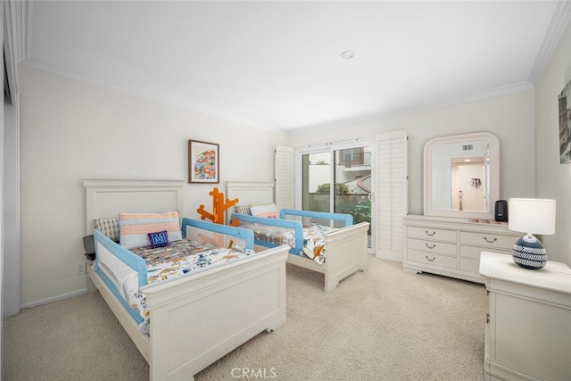bedroom with crown molding and light carpet