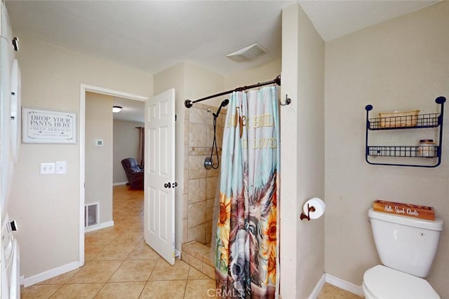 full bath with toilet, visible vents, tile patterned floors, and a tile shower