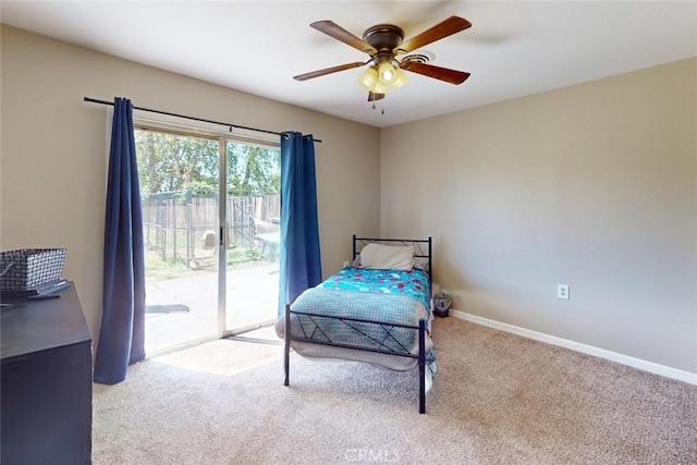 bedroom with baseboards, carpet, ceiling fan, and access to outside