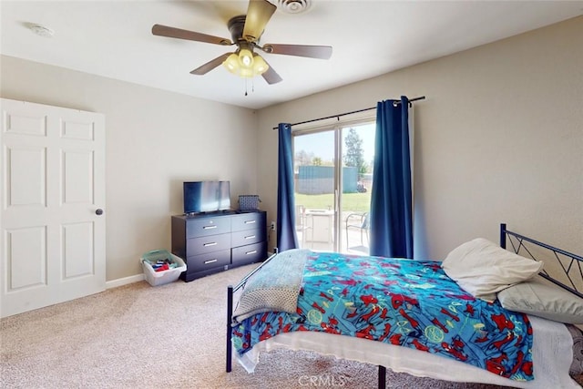 bedroom featuring baseboards, carpet, ceiling fan, and access to exterior