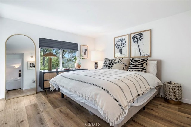 28383 Shady Oaks Rd, Clovis, CA 93619 - bedroom with wood finished floors and baseboards
