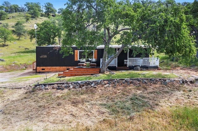 28383 Shady Oaks Rd, Clovis, CA 93619 - view of front facade featuring crawl space and a deck