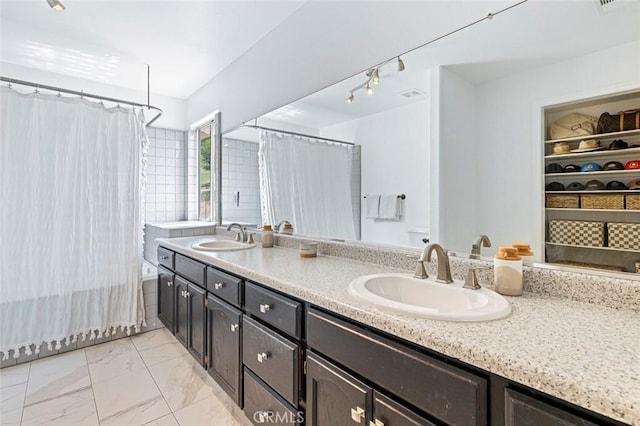 28383 Shady Oaks Rd, Clovis, CA 93619 - full bathroom featuring marble finish floor, a sink, double vanity, and shower / tub combo with curtain