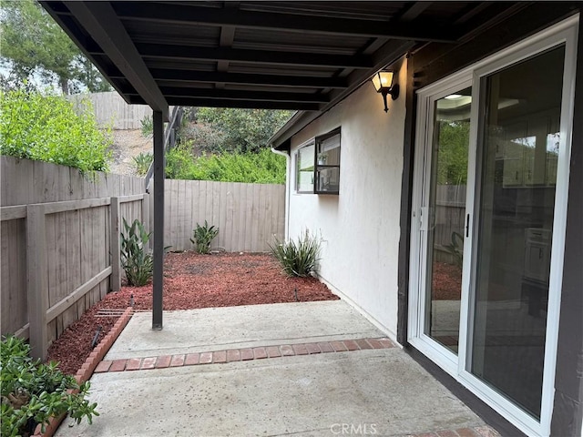 view of patio with a fenced backyard