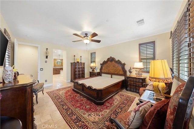 bedroom with visible vents, a ceiling fan, baseboards, and multiple windows