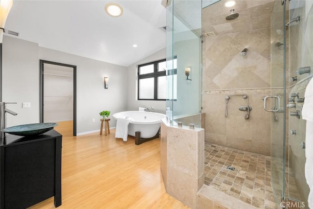 4805 Via Amante, Yorba Linda, CA 92886 - full bathroom with a shower stall, a freestanding bath, wood finished floors, lofted ceiling, and vanity