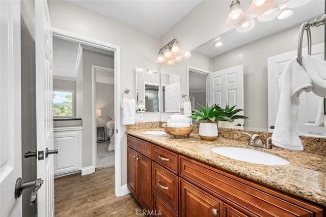 4805 Via Amante, Yorba Linda, CA 92886 - bathroom with double vanity, wood finished floors, and connected bathroom